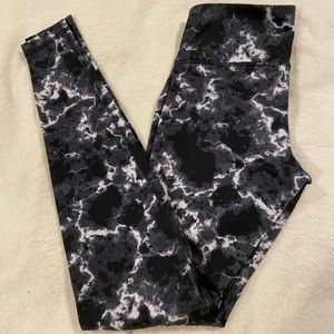 White and black patterned exercise leggings